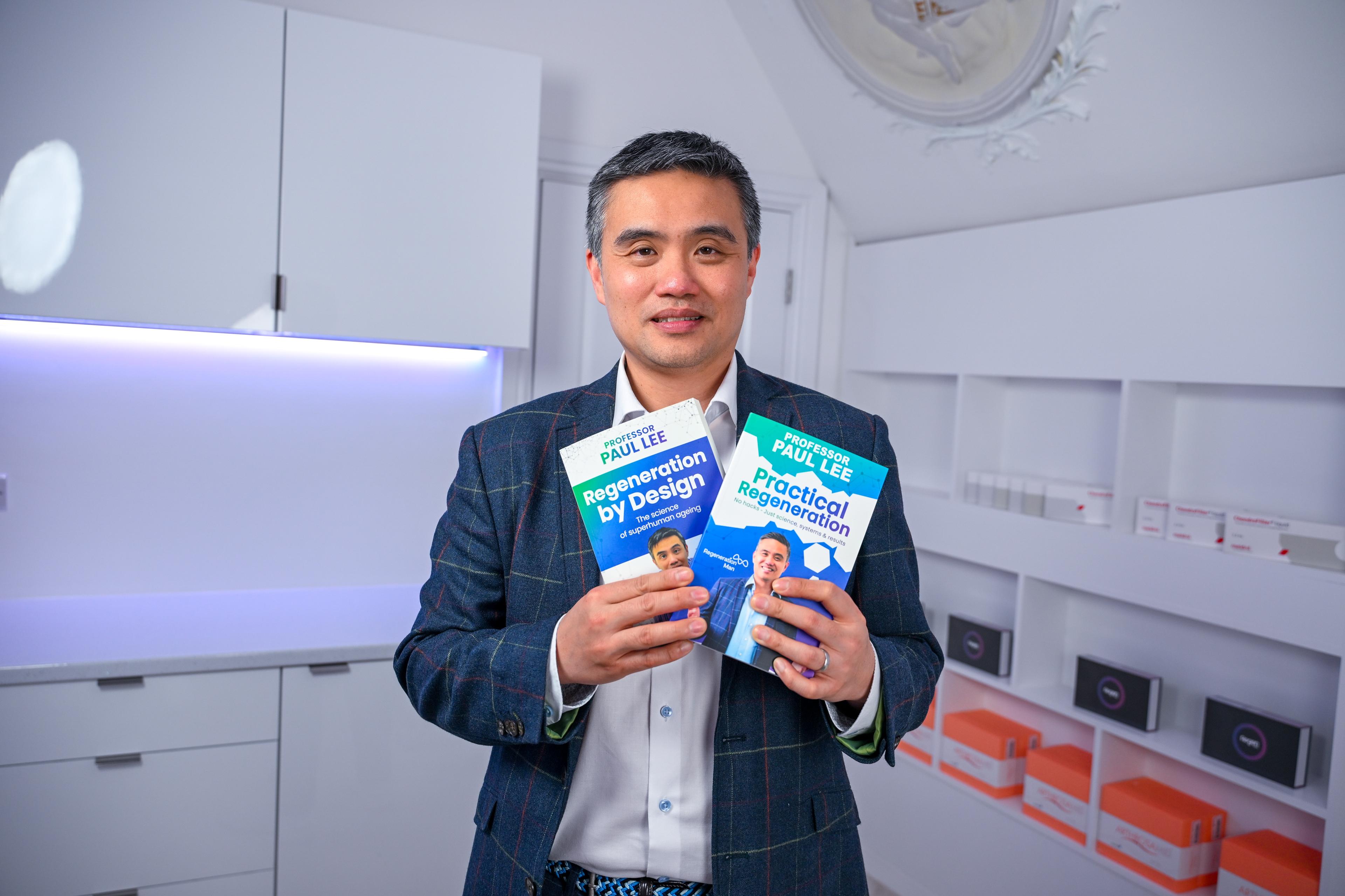 Professor Paul Lee with Practical Regeneration book